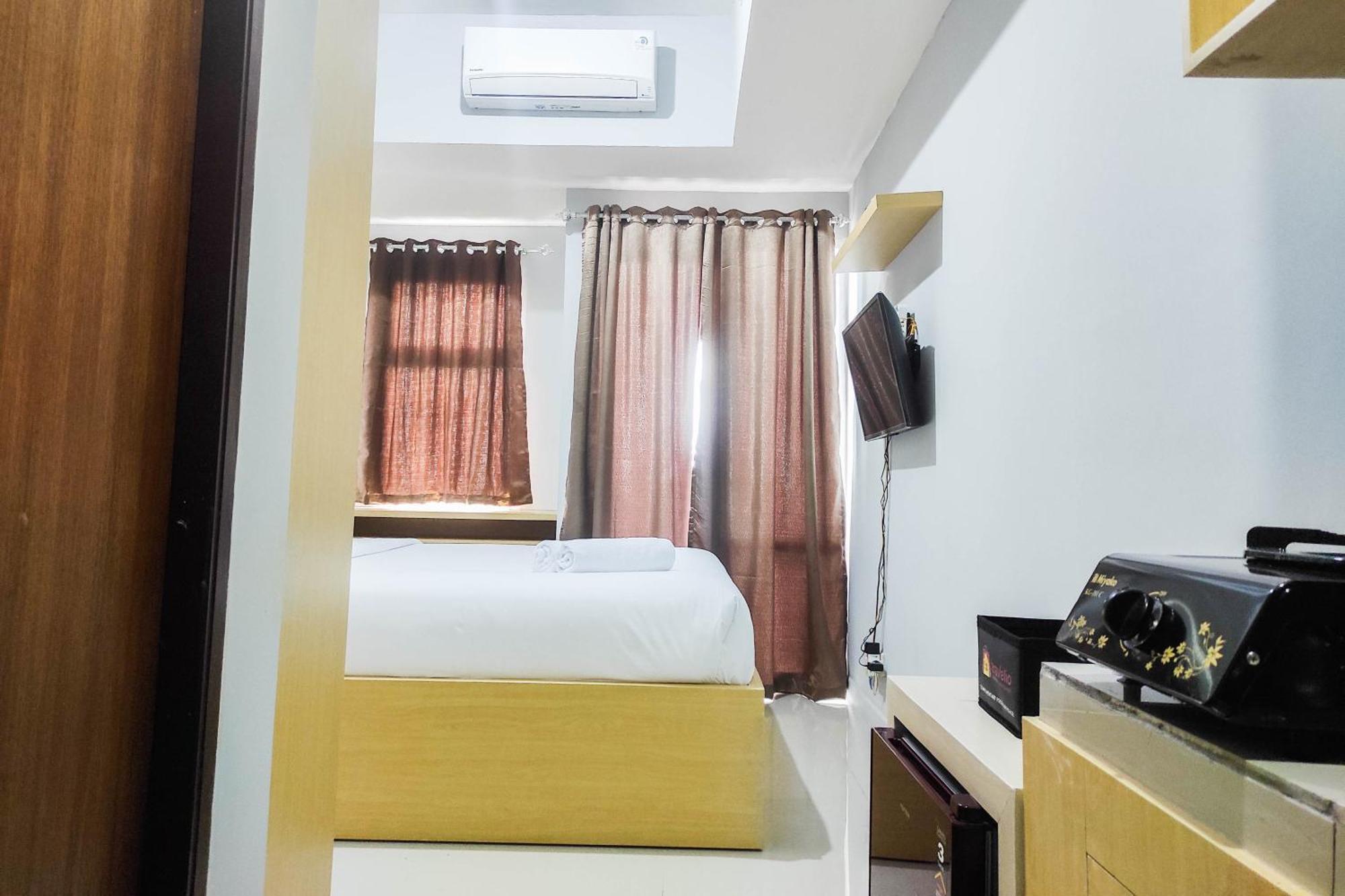 Comfy And Minimalist Studio At Vida View Apartment By Travelio Pampang Экстерьер фото